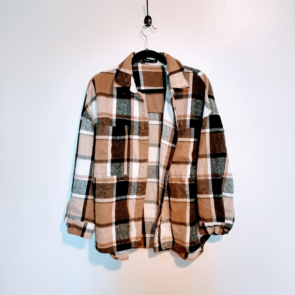 SheIn flannel button up pullover top or jacket, is pretty thick. Has an extra b